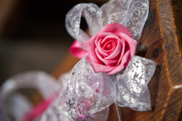 Rose decoration for the pew end in a church