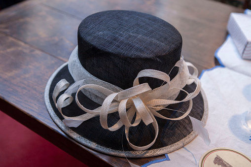 Ladies hat sitting on a table