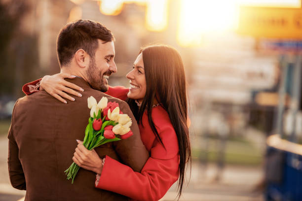 Young couple in love outdoor.Peope, love, romance and happiness concept.