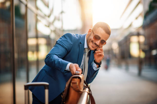 Young businessman using smart phone.People,business, communication and technology concept.