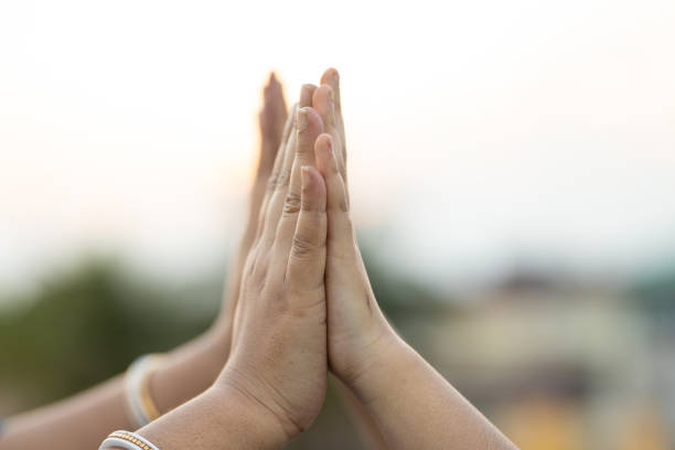 istock Child and Mother hand making high five 1224144411