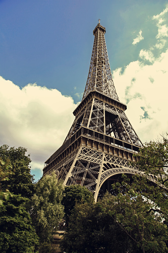 The Eiffel Tower in Paris, France in a beautiful summer day