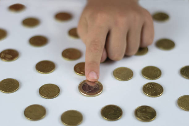 istock Finger pointing to euro currency 1224147309