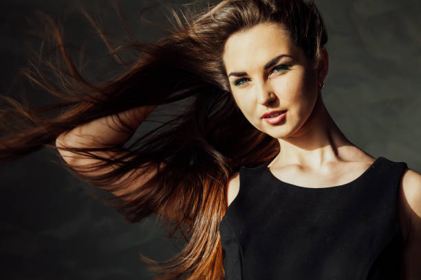 istock beautiful girl posing in the Studio and looking at the camera 1224151066