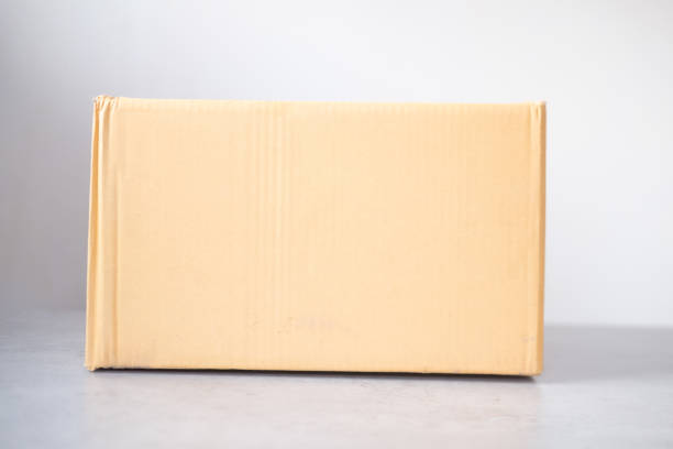 istock Brown paper box on table. Parcel delivery concept 1224152836