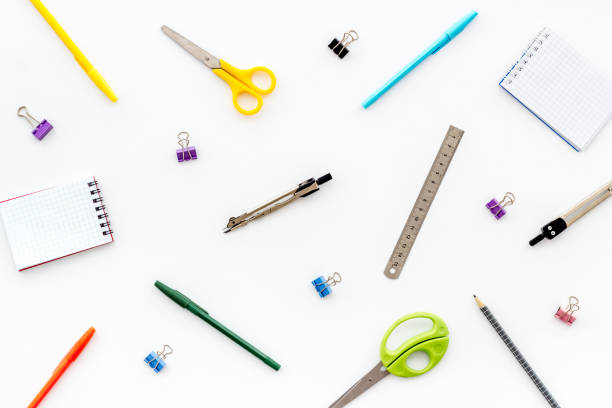 istock Flat lay stationery set - notebook, pen, sciccors - on white background top view 1224154444