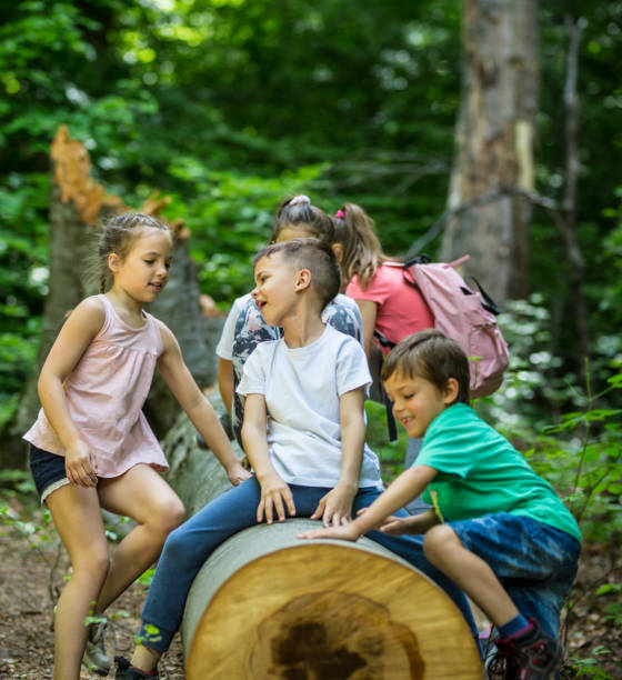 istock Children in the forest 1224154618