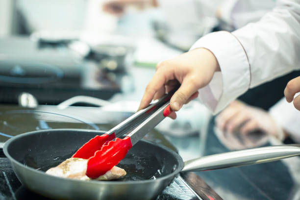 istock Cook prepares the chicken in a frying pan. 1224154784