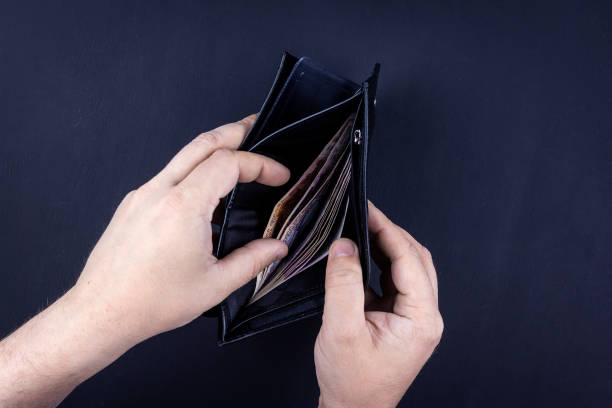 istock wallet with money in hand 1224154857