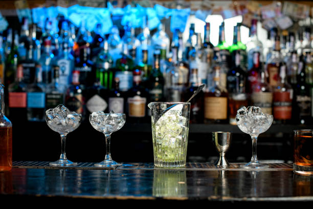 istock Several glasses with ice stand on bar counter. 1224155983