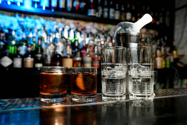 istock Several glasses with different drinks stand at the bar. 1224156050