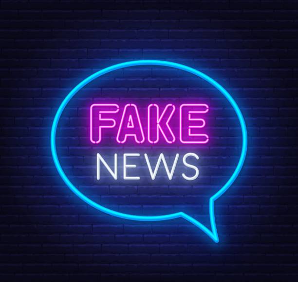 istock Neon fake news sign on brick wall background. 1224157784
