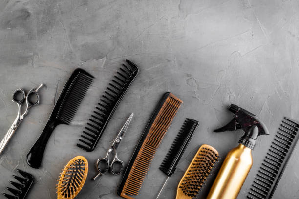 istock Hairdresser tools. Flat lay on grey background top view copy space 1224160592