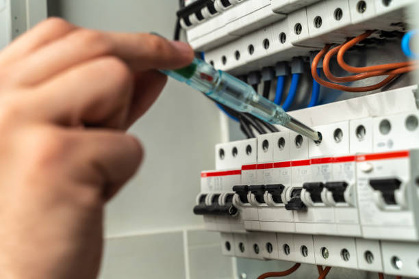 istock Electrician checking fuse box, close-up 1224161169