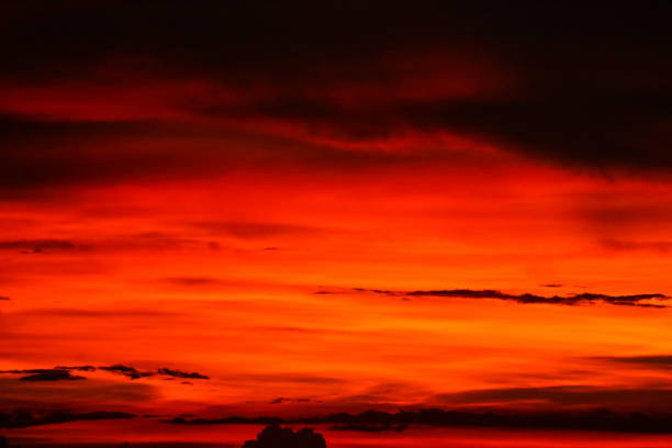 istock sunset on last light red sky silhouette cloud in evening 1224161243