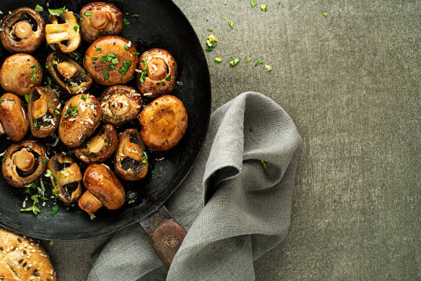 istock Fresh mushrooms Cooking in pan 1224161766
