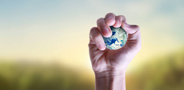 istock Globe ,earth in  hand, holding our planet glowing. Earth image provided by Nasa 1224162153