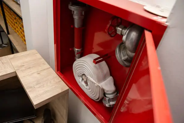 Fire protection cabinet with fire hydrant and hose. It's in the store.