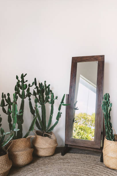 istock Room with cozy interior design, mirror in wooden frame 1224167977