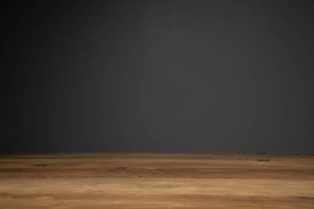 istock top of wooden table and dark background with copy space. 1224169954