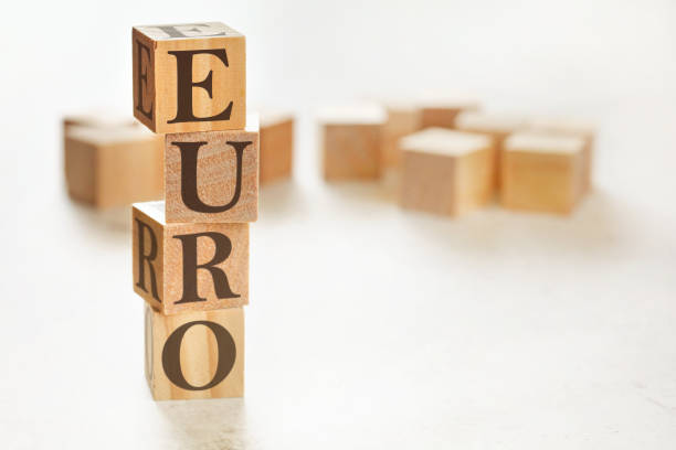 istock Four wooden cubes arranged in stack with text YYYY (meaning xxx) on them, space for text / image at down right corner 1224170102
