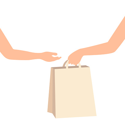 Hand holding and giving paper bag to other hand. Customer receiving shopping bag from courier, volunteer, social woker. Donation delivery service. Senior care. Hand to hand assistance.