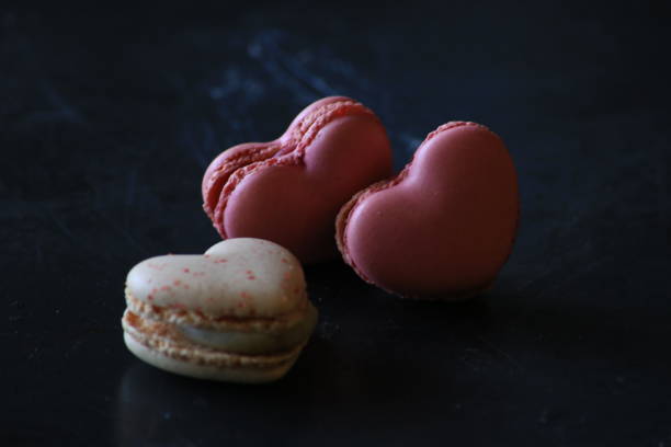 istock heart-shaped macaroons on dark background. Macaroons Heart. Valentine's Day. 1224174437