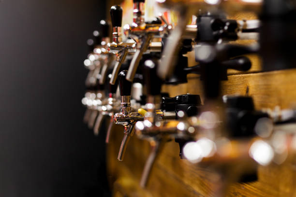 istock Large lager beer in tap at pub. 1224174804