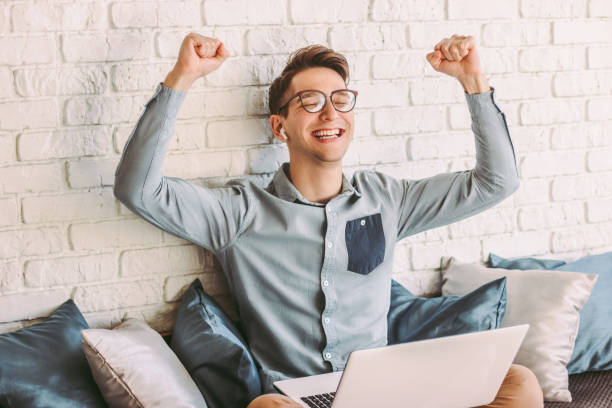 istock Happy hipster man freelancer cheering successful business achievement 1224175716