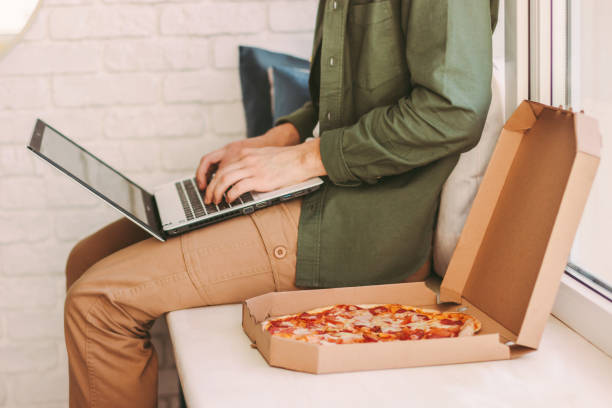 istock Lunch break during busy working day from remote home office 1224175883