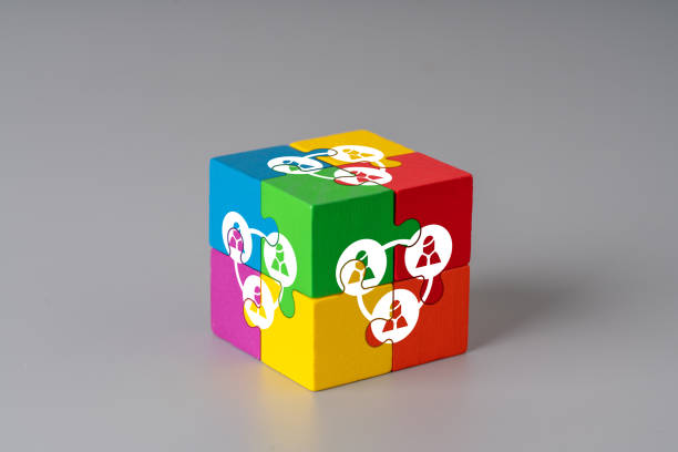 istock Business & HR puzzle cube with hand 1224175890