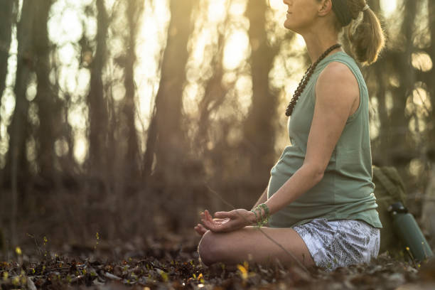 istock Prenatal Yoga in the Forest 1224177780