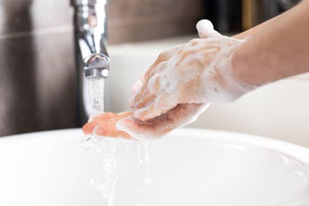 istock Washing hands rubbing with soap woman for coronavirus prevention 1224180062