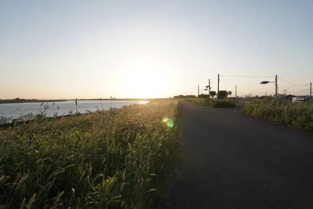 Photo of Bicycle road on the riverbank in japan