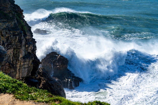 istock Rough waves braking on the rocks 1224183420