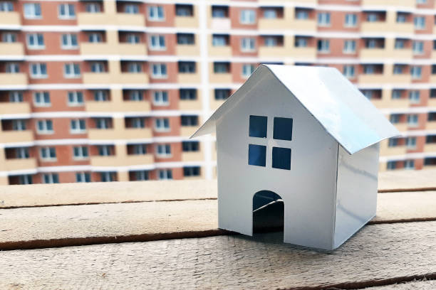 istock House on the background of a building under construction. 1224183885