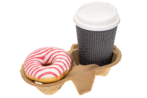 A take out disposable hot drink with a donut - white background