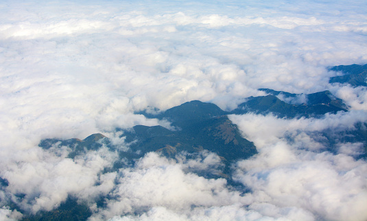 An endless ocean of clouds covering central Taiwan, broken only by the tallest mountain peaks.