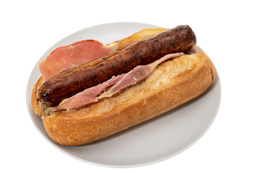 Sausage and bacon bread roll sandwich - white background