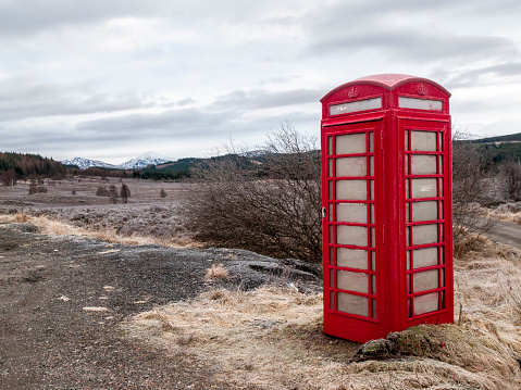 17 August 2023. Findhorn,Moray,Scotland. This is a Red old syle Telephone Box for email, text or phone along with a Bus Stop and Shelter for village transportation.