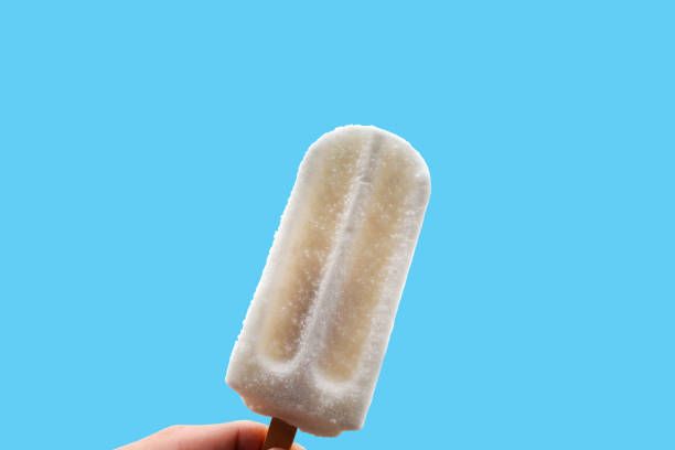 istock White bar ice cream isolated on Pastel blue background 1224193989