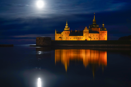 Kalmar, Sweden May 10, 2020 The grounds of the Kalmar Castle at night and moonrise.