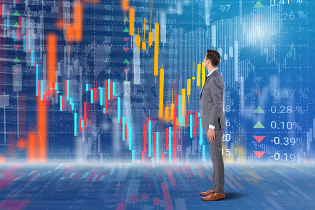 istock Businessman analyzing data in front of stock market virtual interface 1224195978