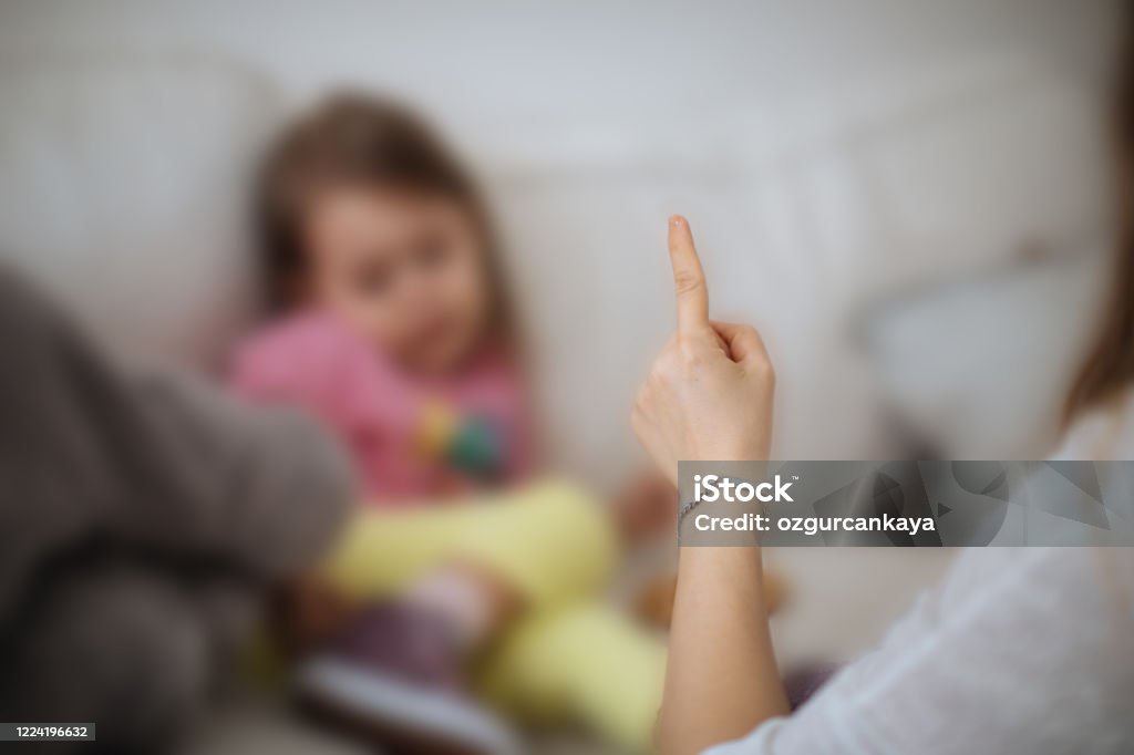 Little child girl crying Father Hitting Young Daughter - domestic violence Child Stock Photo