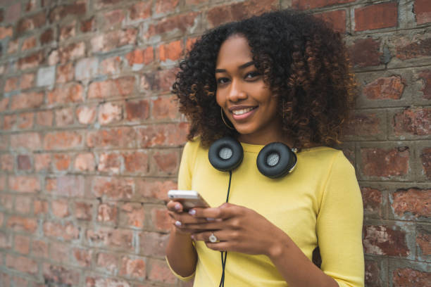 istock Afro-American woman using mobile phone. 1224196791