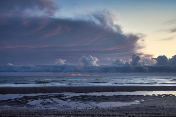 istock Sunset on the beach, Whanganui River mouth 1224198897