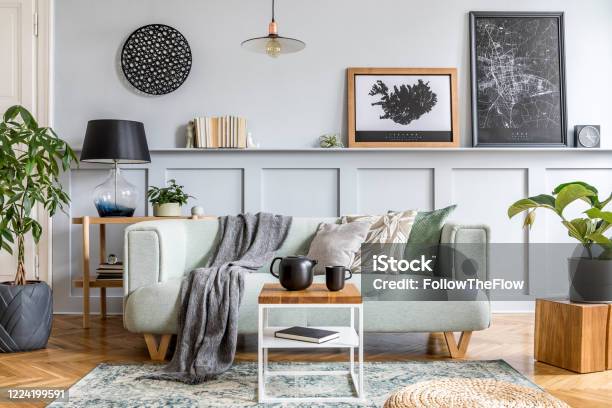 Stylish Interior Design Of Living Room With Modern Mint Sofa Wooden Console Cube Coffee Table Lamp Plant Mock Up Poster Frame Pillows Plaid Decoration And Elegant Accessories In Home Decor Stock Photo - Download Image Now