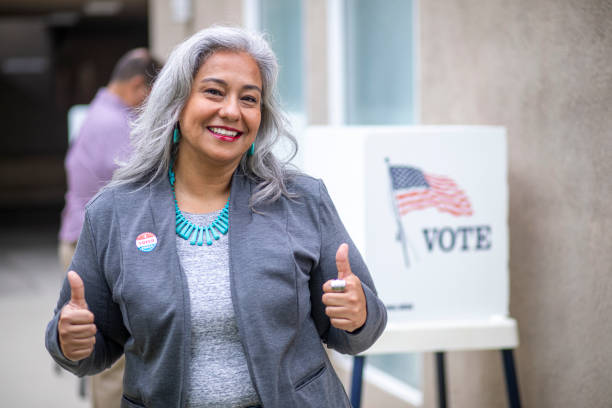 istock Senior Mexican Woman Voting 1224200928