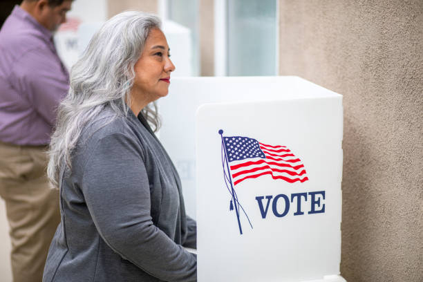 istock Senior Mexican Woman Voting 1224201202