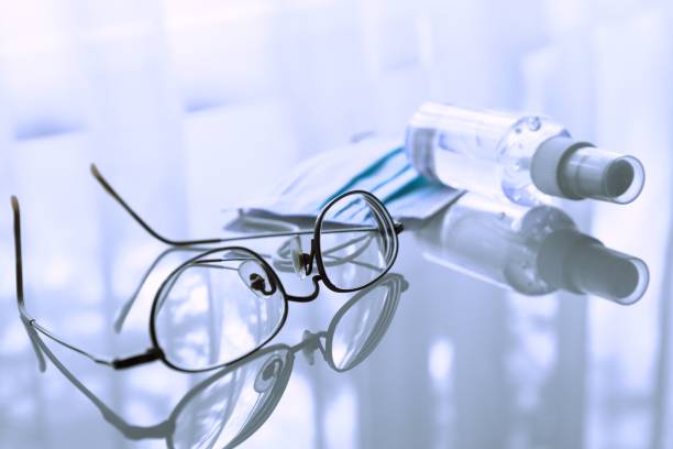 istock Disposable medical mask, hand sanitizer and spectacles 1224202357
